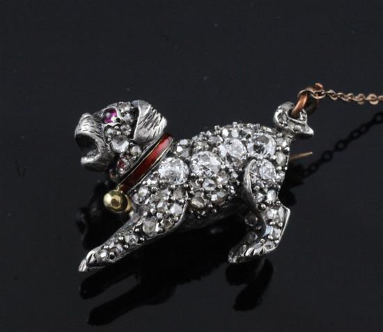 A late Victorian gold, silver and diamond pug dog brooch, 23mm.